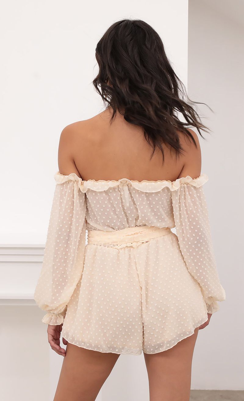 Picture Vallarta Off The Shoulder Romper in Chiffon Polka Dot Ivory. Source: https://media.lucyinthesky.com/data/Aug20_2/800xAUTO/781A9020.JPG