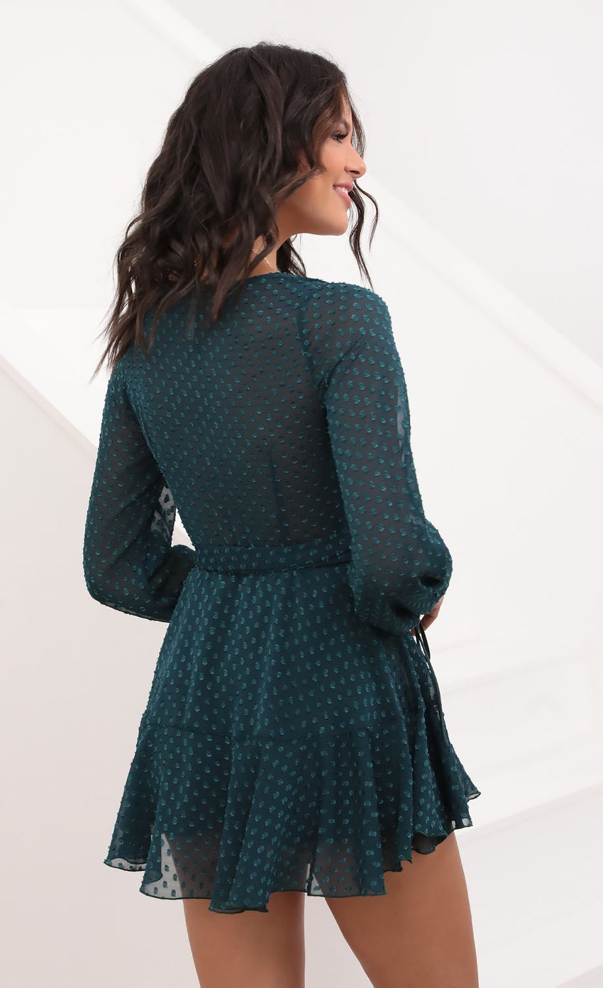 Picture Lexi Ruffle Wrap Dress in Dotted Emerald Chiffon. Source: https://media.lucyinthesky.com/data/Aug20_2/850xAUTO/781A6587.JPG
