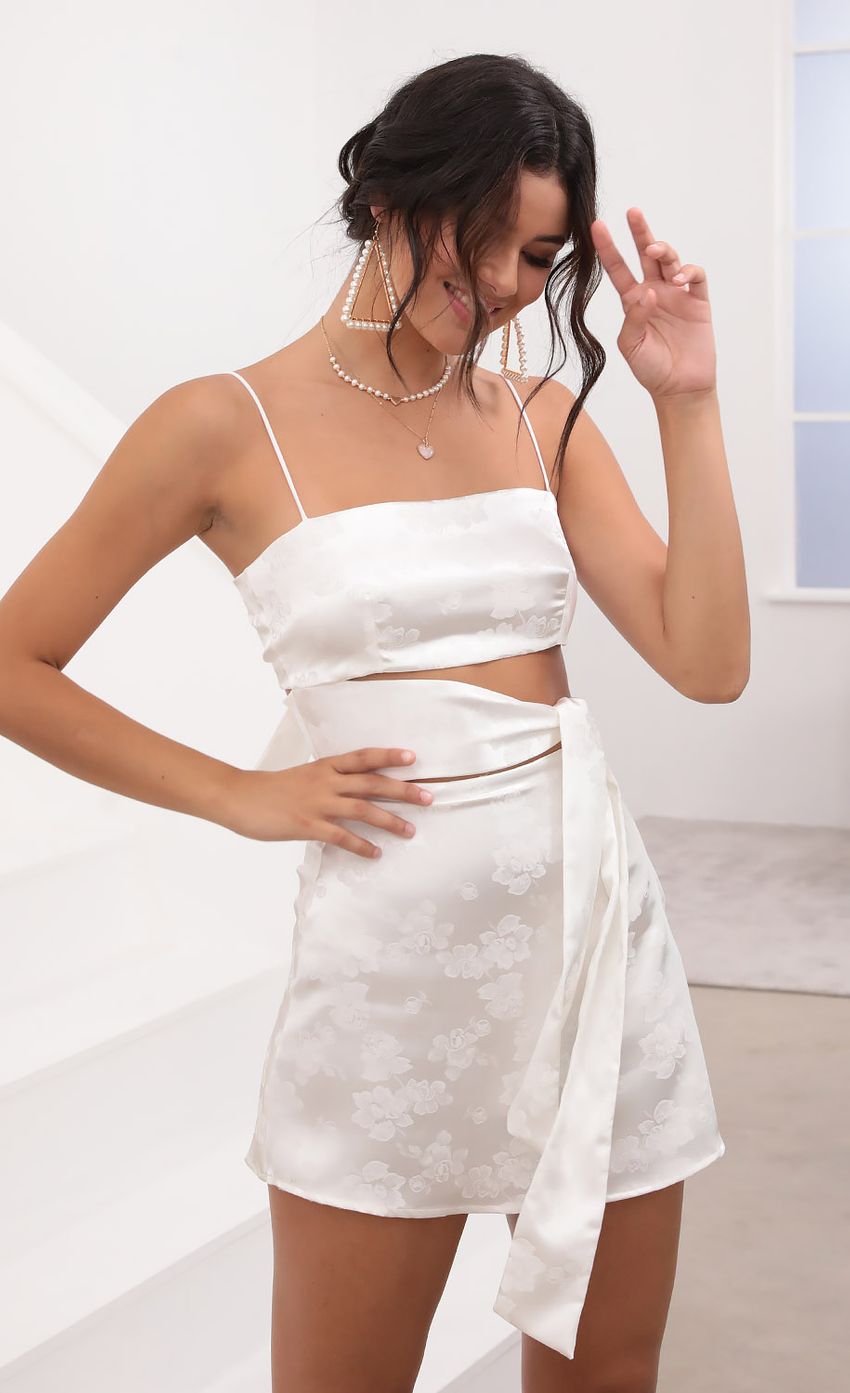 Picture Betsy Cutout Tie Dress in White Satin. Source: https://media.lucyinthesky.com/data/Aug20_2/850xAUTO/781A7146.JPG