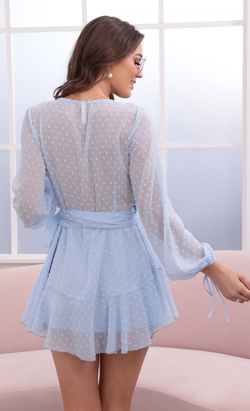 Picture Lexi Ruffle Wrap Dress in Baby Blue. Source: https://media.lucyinthesky.com/data/Aug21_1/500xAUTO/1V9A2239.JPG