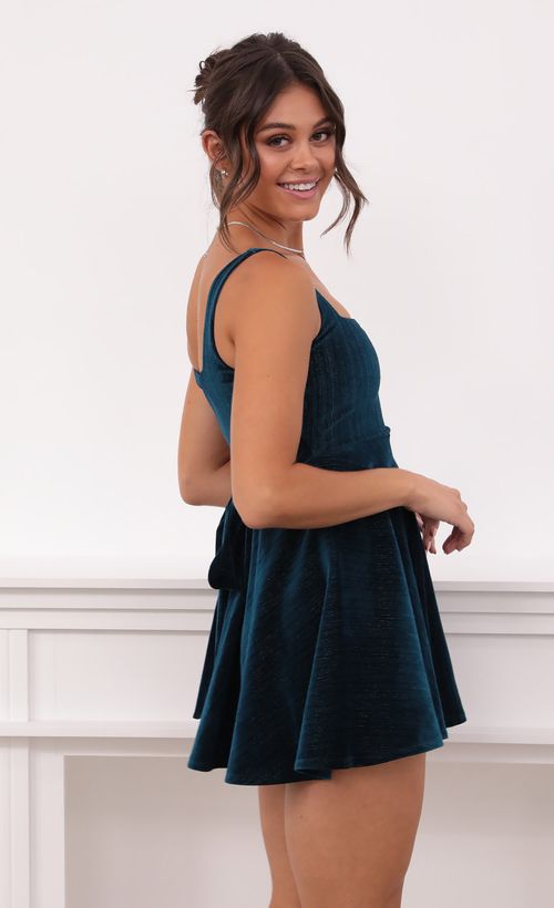 Picture Key West A-line Velvet Dress in Turquoise. Source: https://media.lucyinthesky.com/data/Aug21_1/500xAUTO/1V9A5070.JPG