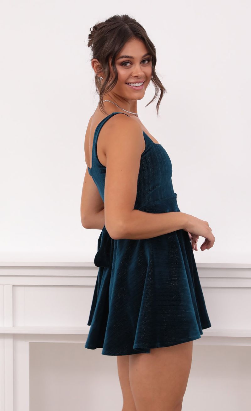 Picture Key West A-line Velvet Dress in Turquoise. Source: https://media.lucyinthesky.com/data/Aug21_1/800xAUTO/1V9A5070.JPG