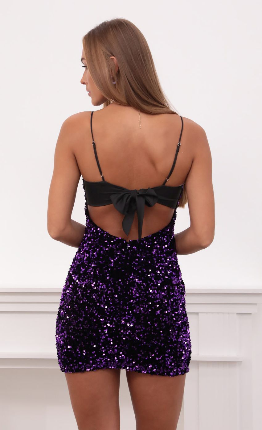 Picture Empress Sequin Velvet Dress in Purple. Source: https://media.lucyinthesky.com/data/Aug21_1/850xAUTO/1V9A3411.JPG
