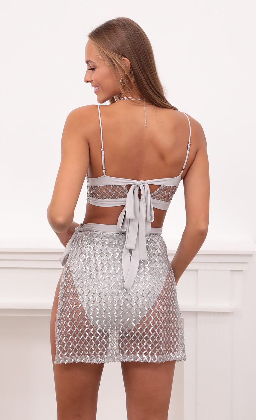 Picture Party Girl Glitter Mesh Set in Silver. Source: https://media.lucyinthesky.com/data/Aug21_1/850xAUTO/1V9A9591.JPG