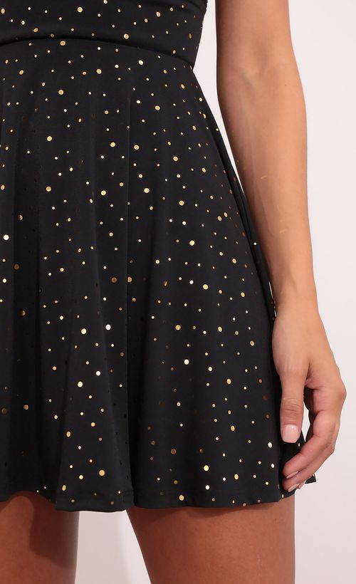 Picture Savanna Fit and Flare Dress in Black and Gold Polka Dot. Source: https://media.lucyinthesky.com/data/Aug21_2/500xAUTO/1V9A0839.JPG