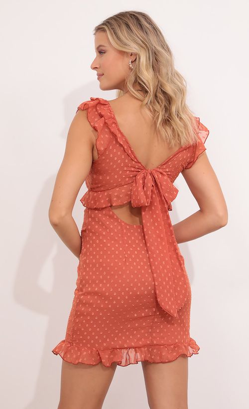 Picture Angie Dotted Chiffon Dress in Rust. Source: https://media.lucyinthesky.com/data/Aug21_2/500xAUTO/1V9A8025.JPG