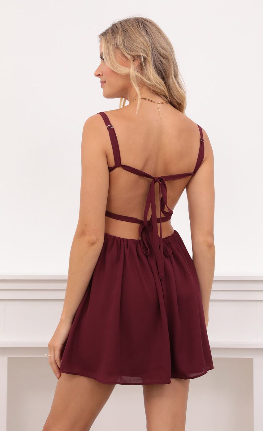 Picture Sawyer Fit and Flare Dress in Burgundy. Source: https://media.lucyinthesky.com/data/Aug21_2/850xAUTO/1V9A2024.JPG
