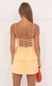 Picture thumb Darby Satin Ruffle Dress in Orange. Source: https://media.lucyinthesky.com/data/Aug22/170xAUTO/1980fc3f-2947-4b97-b0bb-e82b8b57dbc1.jpg