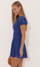 Picture thumb Wannda Dotted Gold Puff Sleeve Dress in Navy. Source: https://media.lucyinthesky.com/data/Aug22/170xAUTO/5e4f6ff9-6666-4a59-a2b1-c6a64e9e412f.jpg