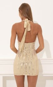 Picture thumb Minnie Sequin Striped Halter Dress in Gold. Source: https://media.lucyinthesky.com/data/Aug22/170xAUTO/b0f1e634-fe52-43b8-ad56-d578c18b58e1.jpg
