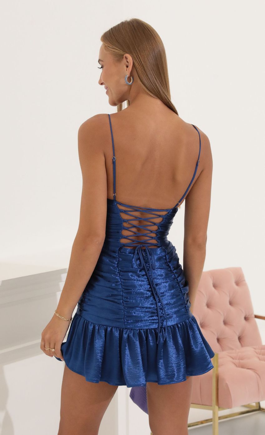 Picture Monique Satin Ruched Ruffle Dress in Navy. Source: https://media.lucyinthesky.com/data/Aug22/850xAUTO/1c9a2987-a9fe-432a-948c-80ae91fd3351.jpg