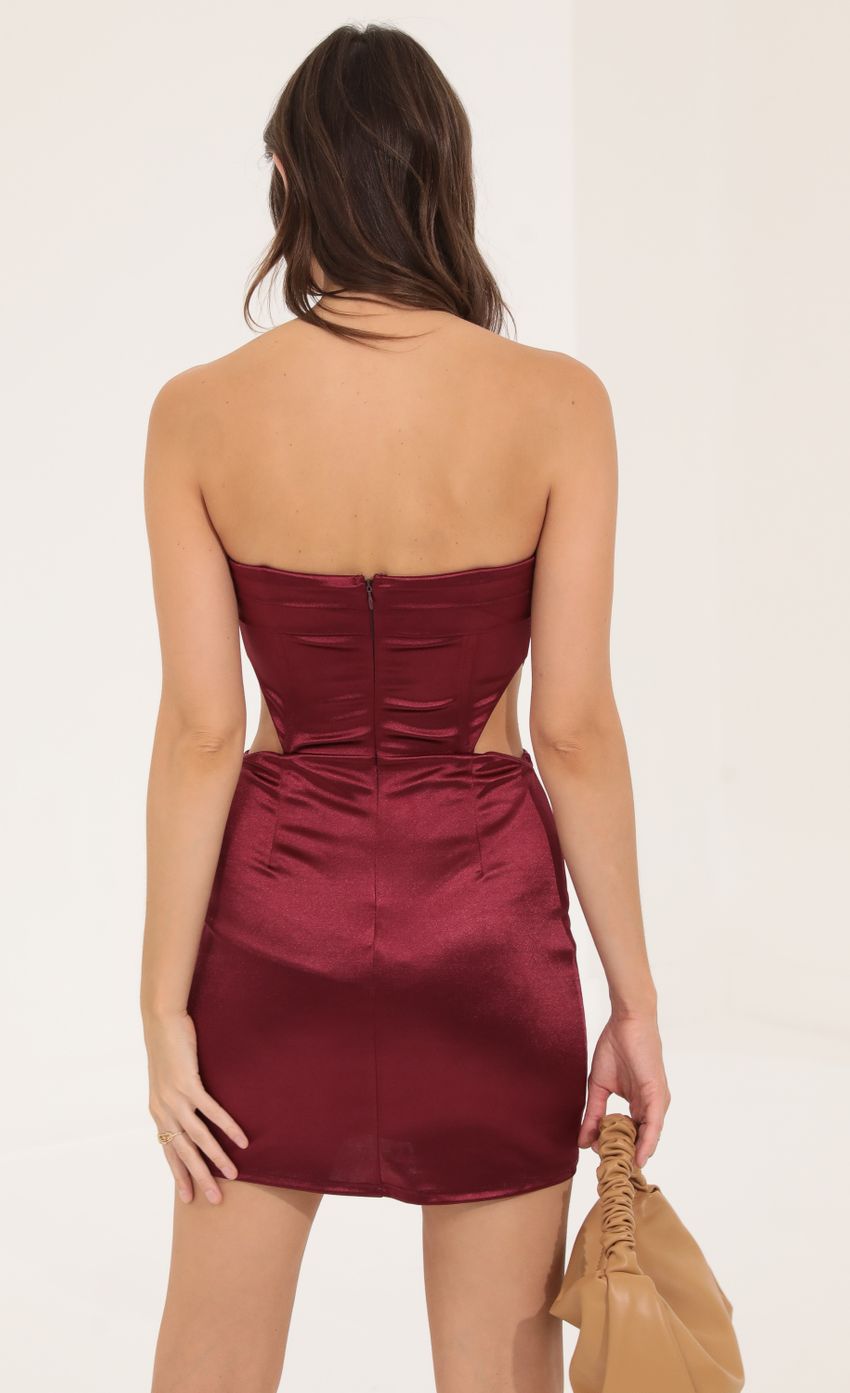 Picture Kammie Satin Corset Cutout Dress in Red. Source: https://media.lucyinthesky.com/data/Aug22/850xAUTO/99b2a973-01b2-4caa-bc2d-bb6b1cc9493f.jpg