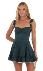 Picture Cindi Jacquard A-Line Dress in Green. Source: https://media.lucyinthesky.com/data/Aug23/150xAUTO/117d9ad8-f187-41a9-a342-e063dd8866d6.jpg