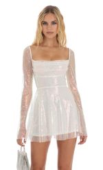 Picture Brooks Iridescent Sequin Flare Dress in White. Source: https://media.lucyinthesky.com/data/Aug23/150xAUTO/30360f9b-8bb4-4f43-8648-07fd1910d6ee.jpg