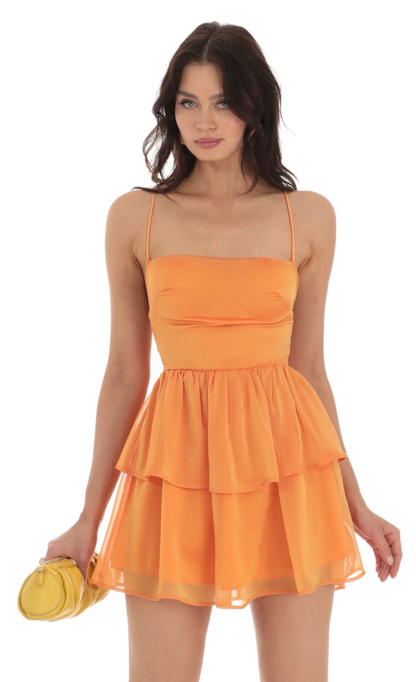 Picture Aspen Chiffon Lace Up Dress in Orange. Source: https://media.lucyinthesky.com/data/Aug23/850xAUTO/0a2c4e04-bf21-4fb3-b1c6-9709f54ee0b3.jpg