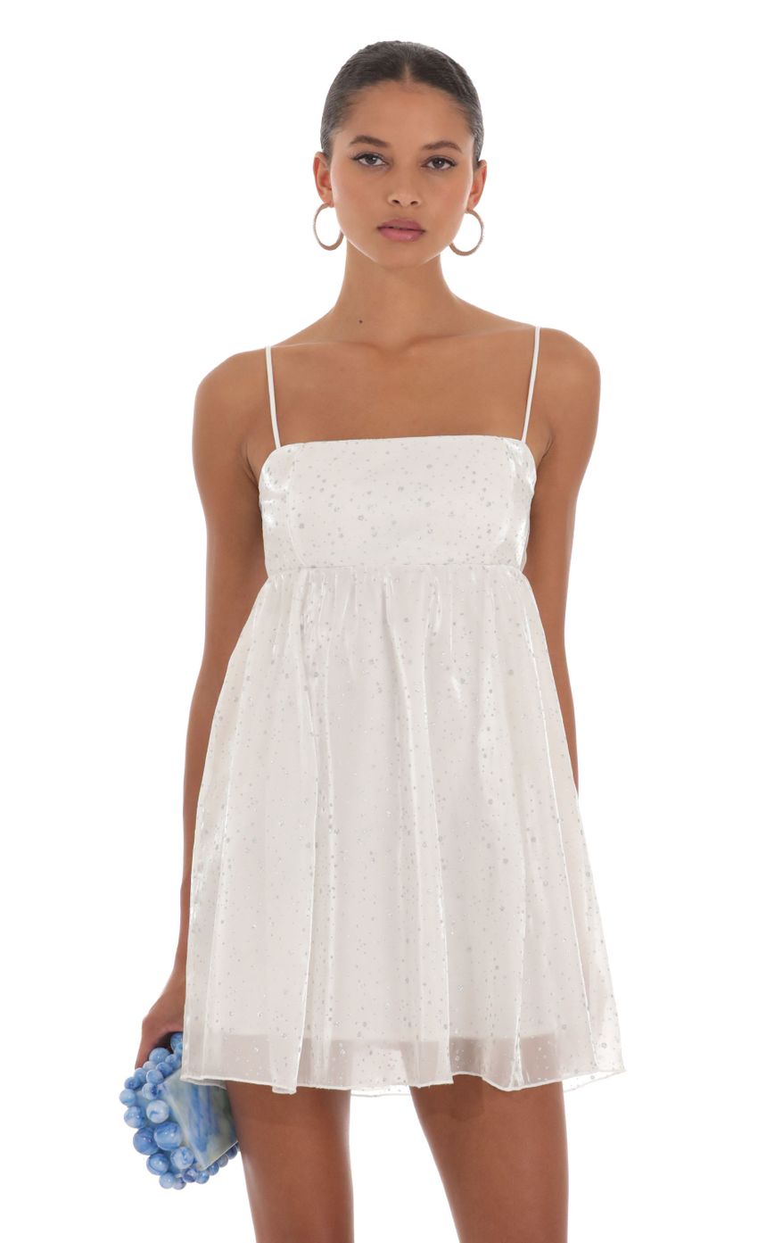 Picture Juno Shimmer Baby Doll Dress in White. Source: https://media.lucyinthesky.com/data/Aug23/850xAUTO/13434062-d6cc-4107-b252-6c5ed43ce4f2.jpg