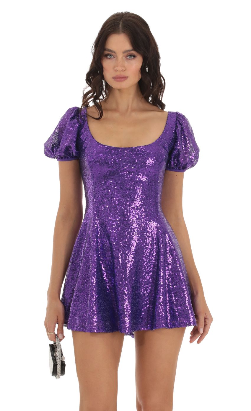 Picture Wannda Sequin Puff Sleeve Dress in Purple. Source: https://media.lucyinthesky.com/data/Aug23/850xAUTO/8400feee-c5ce-494b-a9cb-8646550958ab.jpg