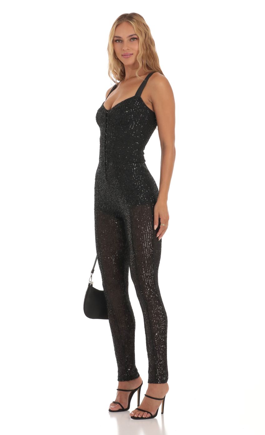 Picture Andromeda Sequin Jumpsuit in Black. Source: https://media.lucyinthesky.com/data/Aug23/850xAUTO/a1ba86ad-a057-466d-8776-3b6017a1a64f.jpg