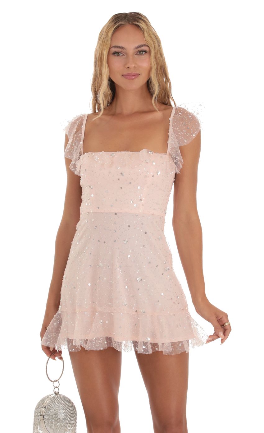 Picture Celosia Sequin Shimmer Ruffle Dress in Pink. Source: https://media.lucyinthesky.com/data/Aug23/850xAUTO/d2f93e21-2121-4d6a-b9be-3abe4c6ff80d.jpg