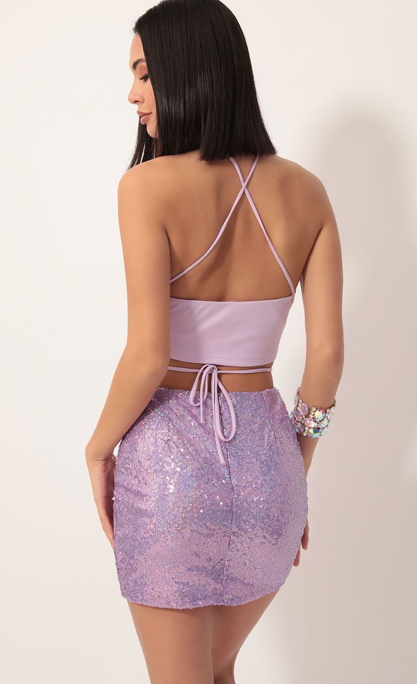 Picture Eva Iridescent Sequin Set in Lilac. Source: https://media.lucyinthesky.com/data/Dec19_1/850xAUTO/781A0332.JPG