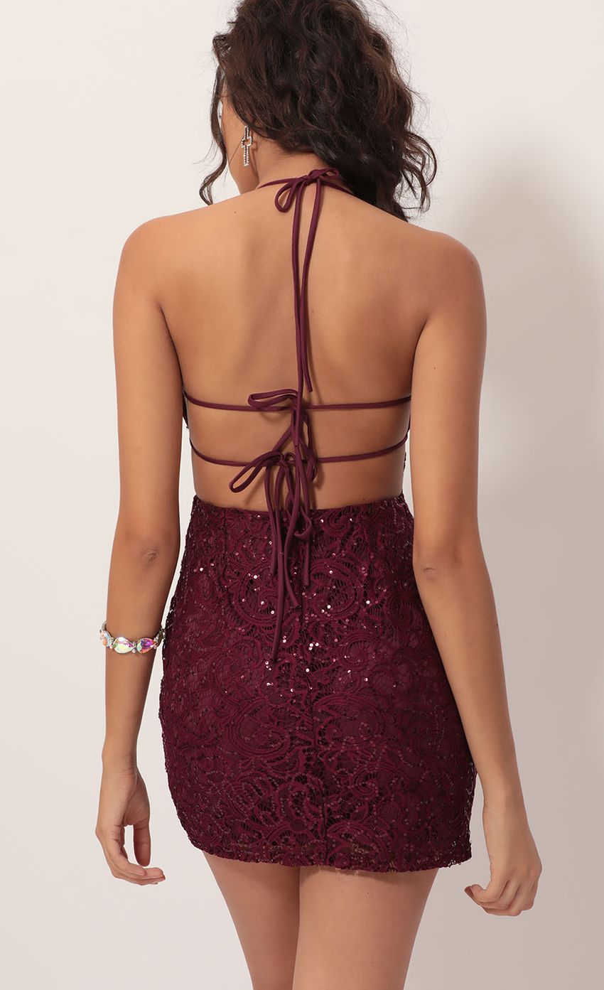 Picture Calabria Sequin Lace Dress in Wine. Source: https://media.lucyinthesky.com/data/Dec19_1/850xAUTO/781A4767.JPG