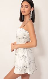 Picture thumb Ariel Satin Tie Back Dress In White Floral. Source: https://media.lucyinthesky.com/data/Dec19_2/170xAUTO/781A6377.JPG