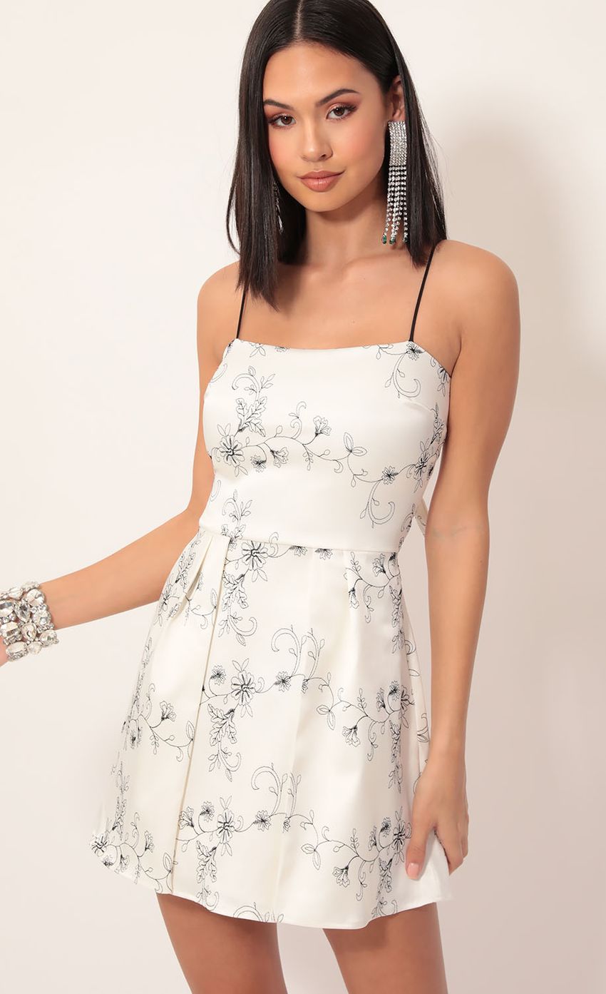 Picture Ariel Satin Tie Back Dress In White Floral. Source: https://media.lucyinthesky.com/data/Dec19_2/850xAUTO/781A6365.JPG