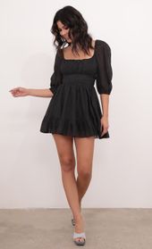 Picture thumb Neia Ruffle Dress in Black Shimmer. Source: https://media.lucyinthesky.com/data/Dec20_1/170xAUTO/1V9A0144.JPG