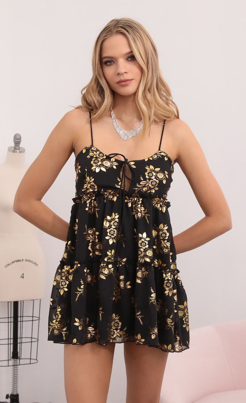 Picture Harlow Baby Doll Dress in Black and Gold Floral. Source: https://media.lucyinthesky.com/data/Dec20_1/850xAUTO/1V9A4087.JPG
