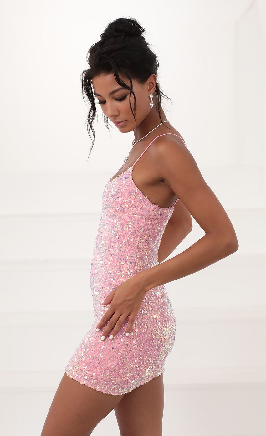 Picture Iridescent Sequin Bodycon Dress in Pink. Source: https://media.lucyinthesky.com/data/Dec20_1/850xAUTO/781A7864.JPG