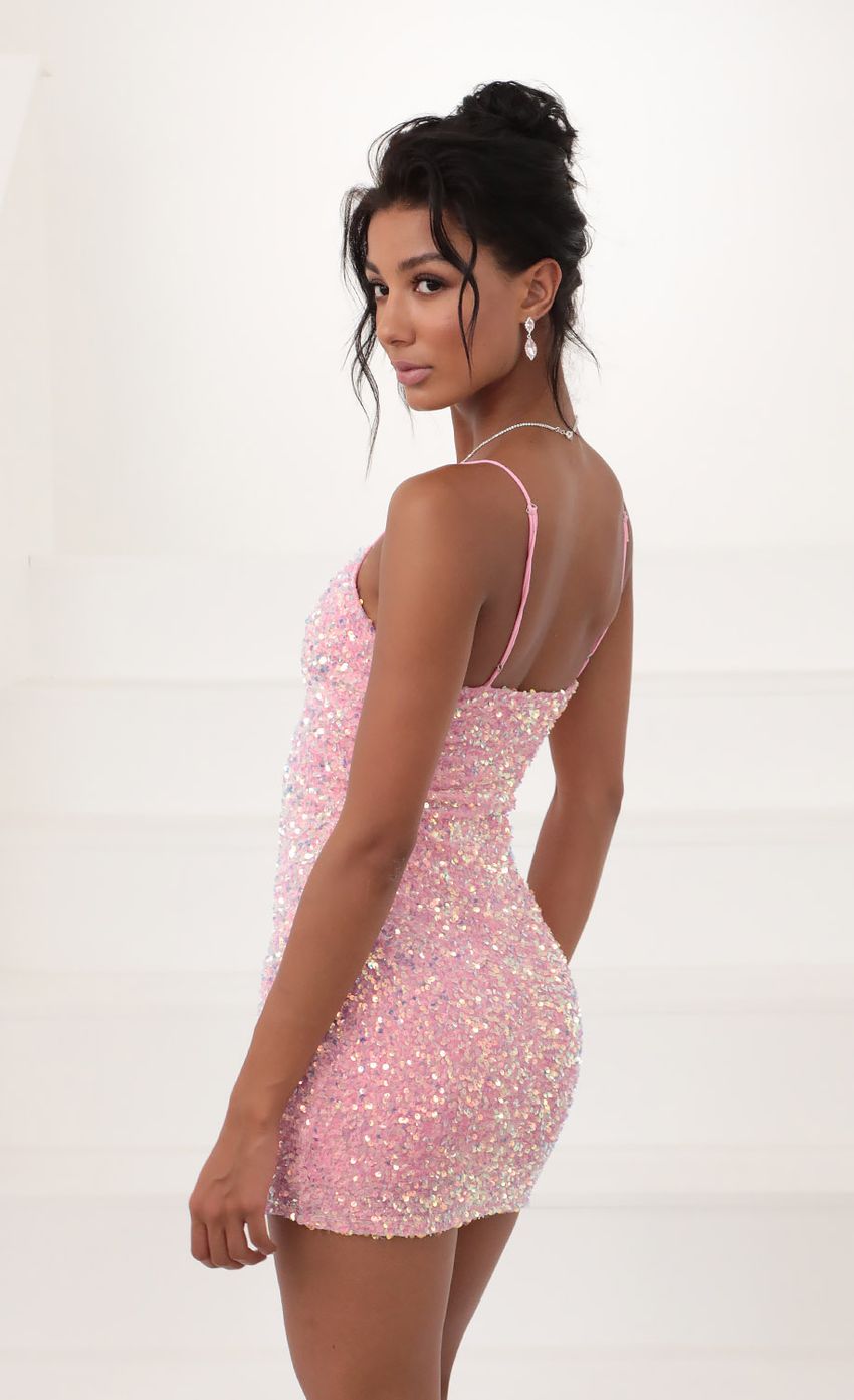 Picture Iridescent Sequin Bodycon Dress in Pink. Source: https://media.lucyinthesky.com/data/Dec20_1/850xAUTO/781A7904.JPG