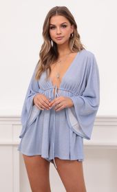 Picture thumb Kadee Bell Sleeve Romper in Powder Blue Shimmer. Source: https://media.lucyinthesky.com/data/Dec20_2/170xAUTO/1V9A0033.JPG