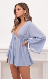Picture thumb Kadee Bell Sleeve Romper in Powder Blue Shimmer. Source: https://media.lucyinthesky.com/data/Dec20_2/170xAUTO/1V9A0045.JPG