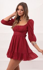 Picture thumb Neia Ruffle Dress in Burgundy. Source: https://media.lucyinthesky.com/data/Dec20_2/170xAUTO/1V9A7084.JPG