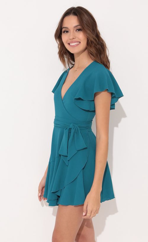 Picture Eliza Wrap Dress in Turquoise. Source: https://media.lucyinthesky.com/data/Dec21_1/500xAUTO/1V9A2136.JPG