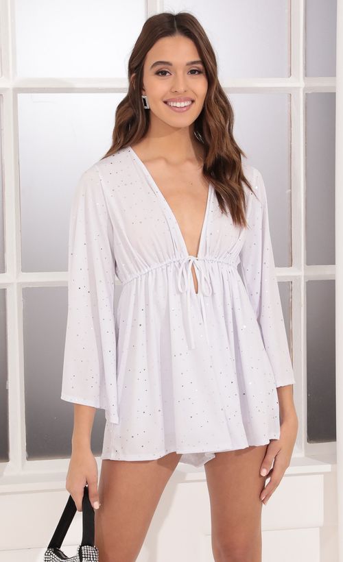Picture Kadee Bell Sleeve Romper in White and Silver. Source: https://media.lucyinthesky.com/data/Dec21_1/500xAUTO/1V9A38991.JPG