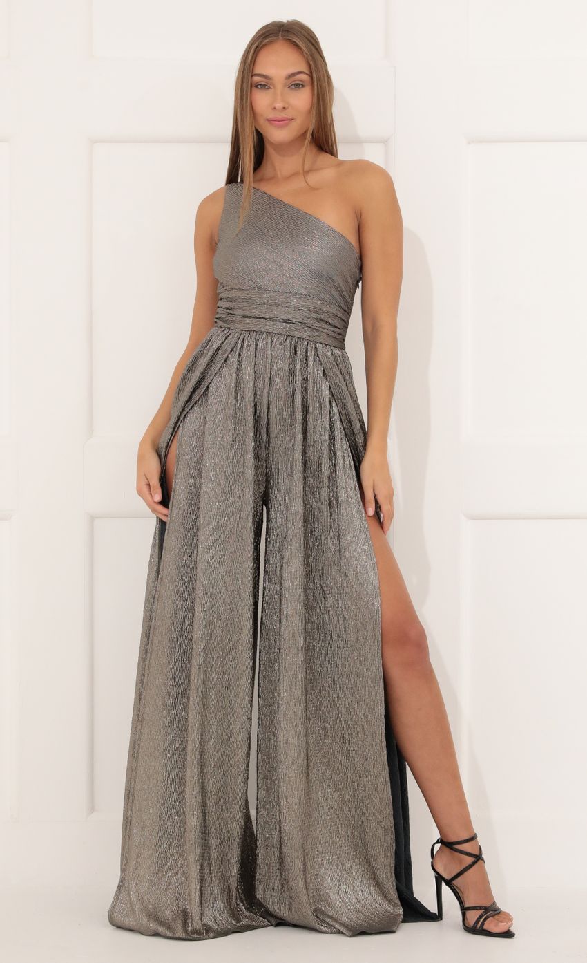 Picture Mary One Shoulder Jumpsuit in Silver Shimmer. Source: https://media.lucyinthesky.com/data/Dec21_2/850xAUTO/1V9A5112.JPG