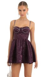 Picture Kadri Floral Rhinestone Corset Dress in Purple. Source: https://media.lucyinthesky.com/data/Dec22/150xAUTO/134e856b-ee24-4ce6-9577-9e7a48a17749.jpg