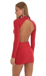 Picture Agnes Velvet Sequin Open Back Dress in Red. Source: https://media.lucyinthesky.com/data/Dec22/150xAUTO/16c8fa62-057c-4abc-b0e4-7dfd5af788c5.jpg