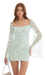 Picture Elly Flare Sleeve Sequin Dress in Turquoise. Source: https://media.lucyinthesky.com/data/Dec22/150xAUTO/493412d9-8f6c-443c-99ea-06fc624ba6ac.jpg