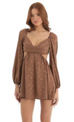 Picture Krista Floral Long Sleeve Fit and Flare Dress in Brown. Source: https://media.lucyinthesky.com/data/Dec22/150xAUTO/49760022-74cd-4ab6-b176-729c5e23fee1.jpg
