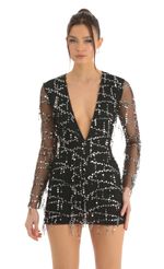 Picture Paris Mesh Iridescent Sequin Plunge Dress in White. Source: https://media.lucyinthesky.com/data/Dec22/150xAUTO/5d5309bc-ef5b-4e5e-a405-c3f8d26c1830.jpg