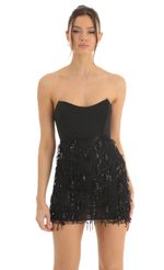 Picture Hollie Dangling Sequin Corset Dress in Black. Source: https://media.lucyinthesky.com/data/Dec22/150xAUTO/665db9d4-9e1c-4afb-80bf-43b7805be792.jpg