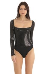 Picture Aislin Sequin Long Sleeve Bodysuit in Silver. Source: https://media.lucyinthesky.com/data/Dec22/150xAUTO/7e489bc6-ecf6-4461-a67c-ac6dd1ae6b50.jpg