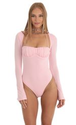Picture Lexa Flare Long Sleeve Bodysuit in Pink. Source: https://media.lucyinthesky.com/data/Dec22/150xAUTO/92f27678-d6e8-4719-8700-6eeaf967a27f.jpg