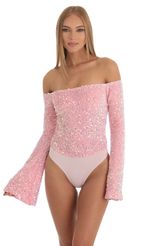 Picture Das Velvet Sequin Bodysuit in Pink. Source: https://media.lucyinthesky.com/data/Dec22/150xAUTO/a2e611ee-12be-4bdd-9759-c4c34a74cb01.jpg