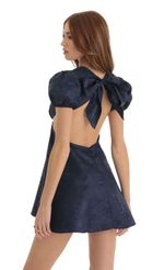 Picture Chandler Floral Jacquard Baby Doll Dress in Blue. Source: https://media.lucyinthesky.com/data/Dec22/150xAUTO/b1a7e992-d49e-4dd7-bbbf-015b6c062cf9.jpg