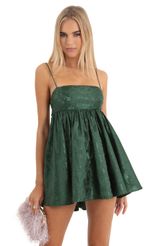 Picture Liora Floral Jacquard Baby Doll Dress in Green. Source: https://media.lucyinthesky.com/data/Dec22/150xAUTO/e812f4c5-f0e8-4397-9a17-f6feea73926a.jpg