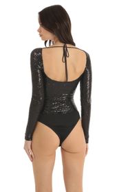 Picture thumb Aislin Sequin Long Sleeve Bodysuit in Black. Source: https://media.lucyinthesky.com/data/Dec22/170xAUTO/0398b307-35f0-4d91-8283-58a254e48f79.jpg