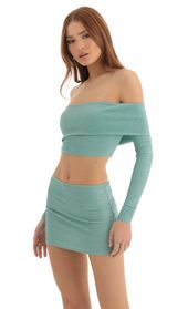 Picture thumb Sama Metallic Knit Two Piece Skirt Set in Turquoise. Source: https://media.lucyinthesky.com/data/Dec22/170xAUTO/08e01092-d12e-440d-b3fa-179e11111032.jpg